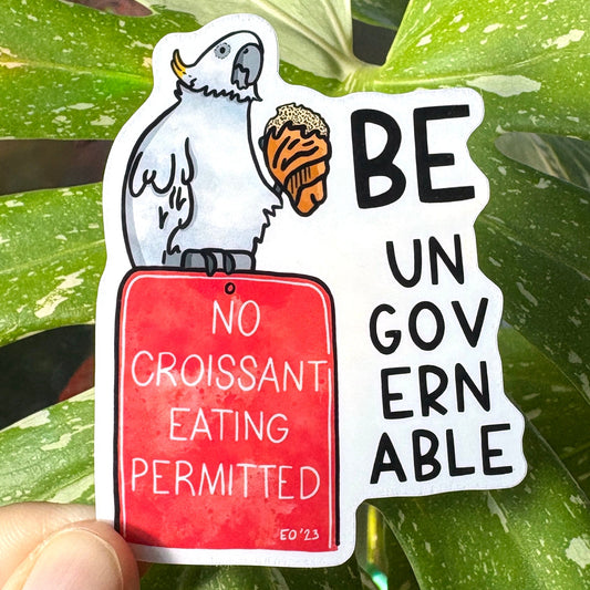 Be Ungovernable - Funny and cute cockatoo eating a croissant sticker